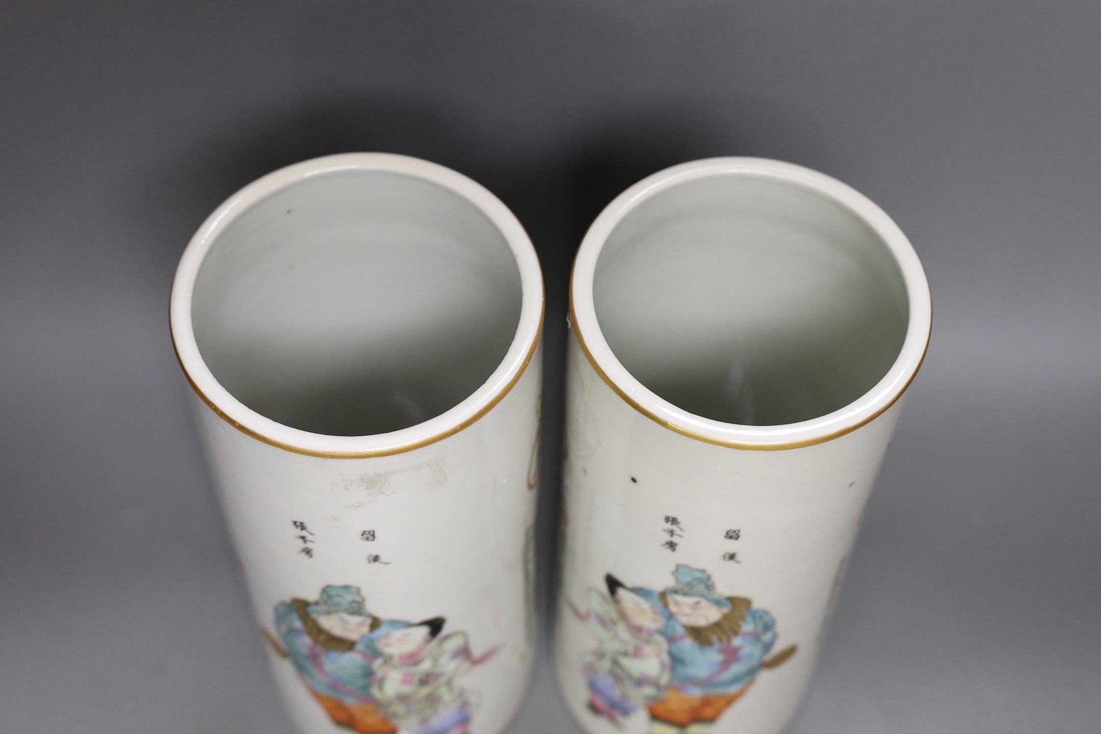 A pair of Chinese cylindrical vases, 29cm